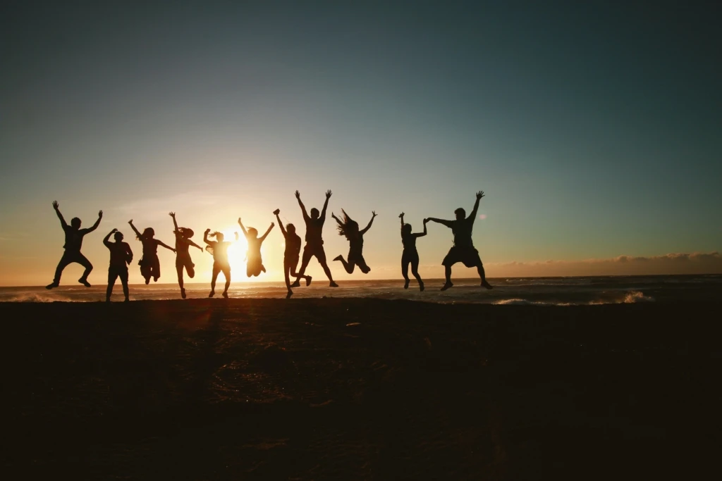 silhouette-photography-of-group-of-people-jumping-during-1000445-1024x683